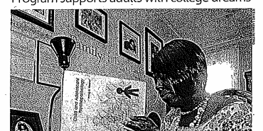 Person studying with educational materials at home.