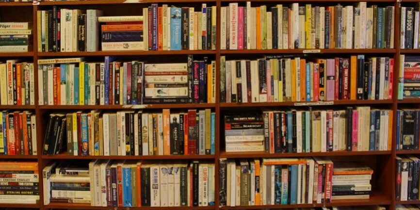 A large collection of books on shelves.