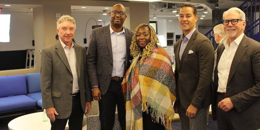 A group of people standing next to each other.